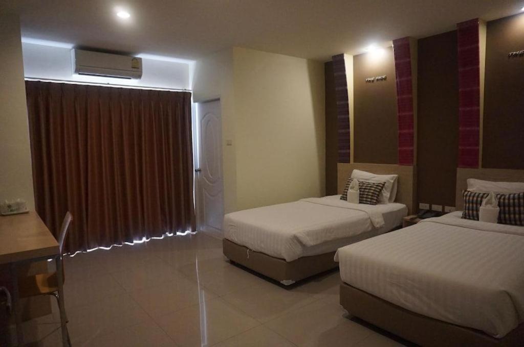 The Rice Hotel Roi Et Esterno foto